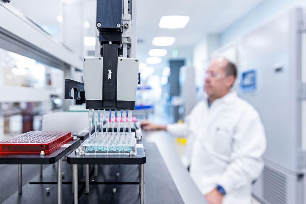 BiomEdit scientist working with lab automation equipment