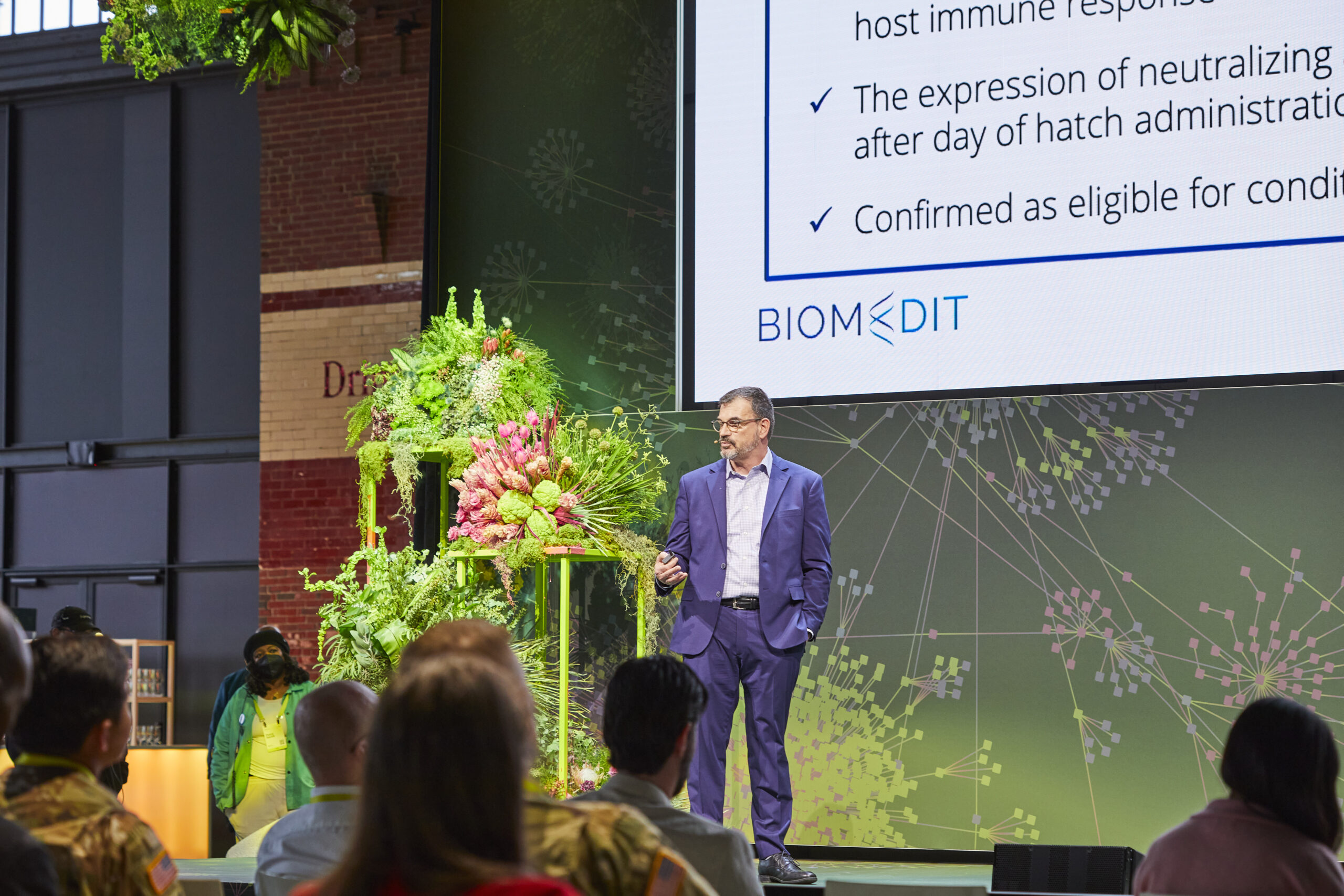 Aaron Schacht presenting on stage at Ginkgo Bioworks' Ferment conference